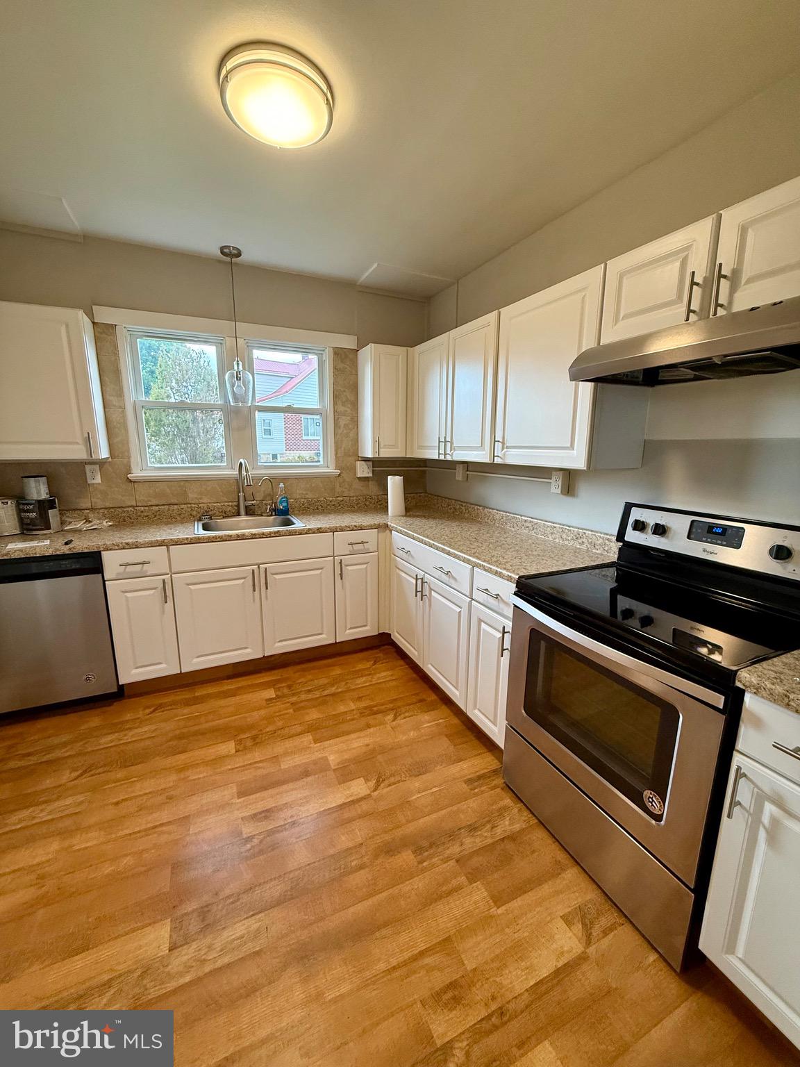 719 East Oldtown Road Cumberland, MD 21502 - Photo 9 of 20 a kitchen with stainless steel appliances granite countertop a sink and cabinets