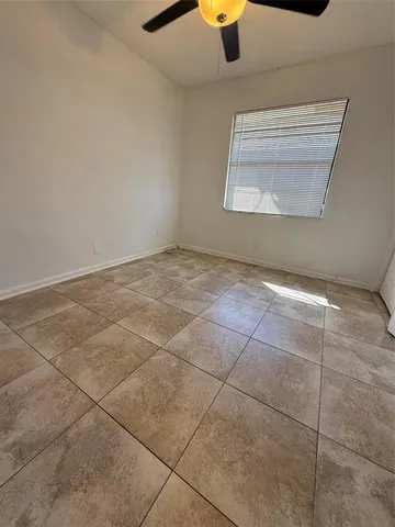 a kitchen with a stove and a microwave