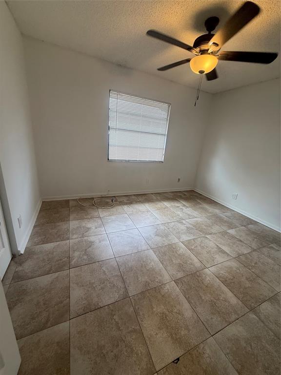 7427 Southwest 13th Street North Lauderdale, FL 33068 - Photo 4 of 49 a view of an empty room with a window