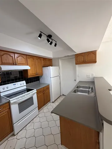 a view of storage and utility room with a garage