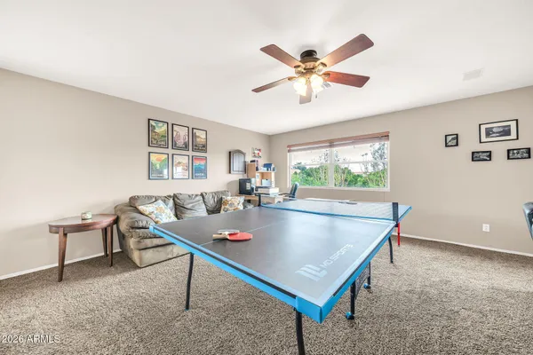 a kitchen with stainless steel appliances granite countertop a sink a stove and cabinets