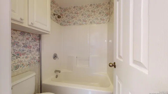 a bathroom with a bathtub