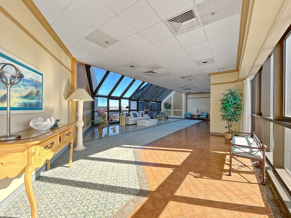 65 Lake Avenue, Unit 1008 Worcester, MA 01604 - Photo 25 of 35 a view of a swimming pool with seating area