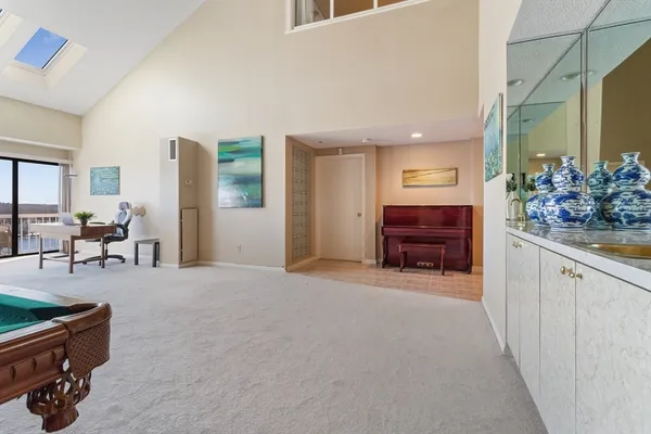 a view of livingroom with furniture and lounge chair