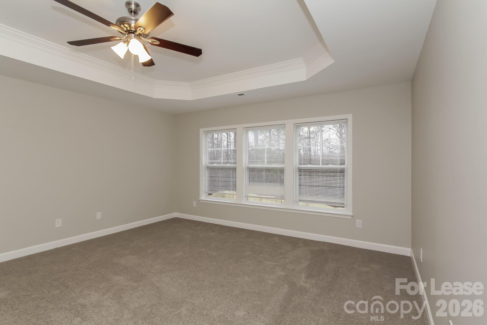 11004 Greenhead View Road Charlotte, NC 28262 - Photo 10 of 17 a view of an empty room with a window