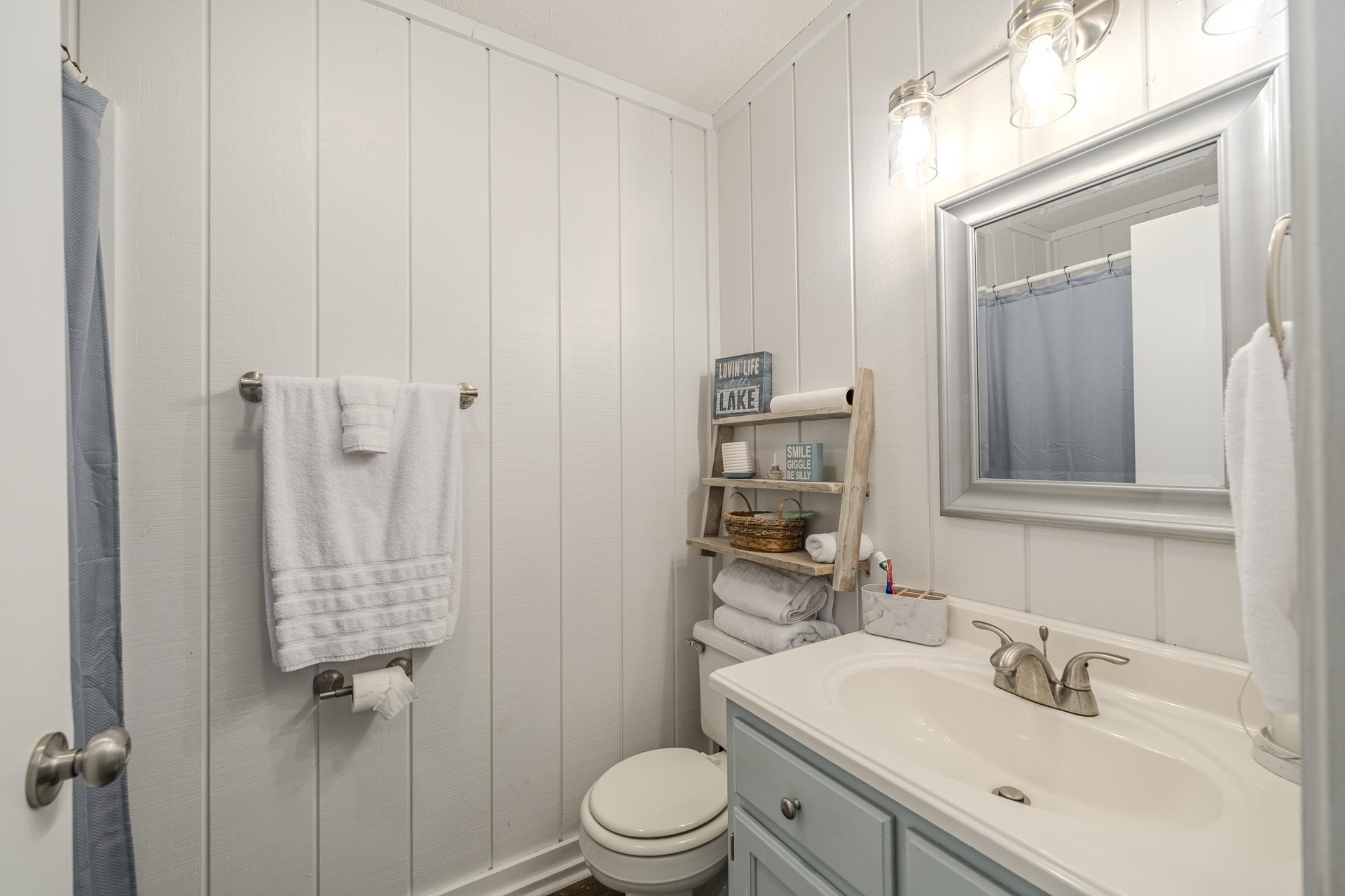 80 Contreau Road Counce, TN 38326 - Photo 14 of 28 a bathroom with a sink a toilet and shower