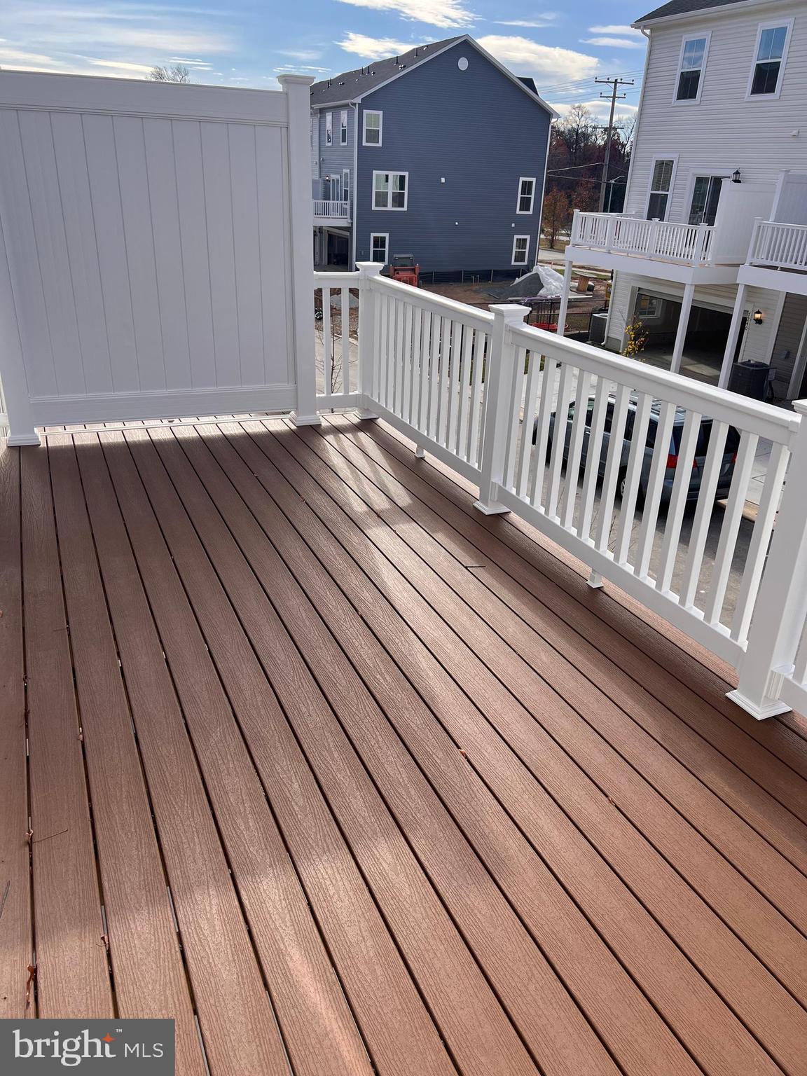 13931 Anderson Garden Road Laurel, MD 20707 - Photo 27 of 32 a view of balcony with wooden floor