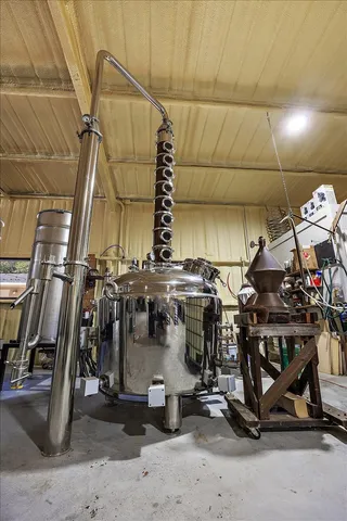 a living room with blue lights with furniture