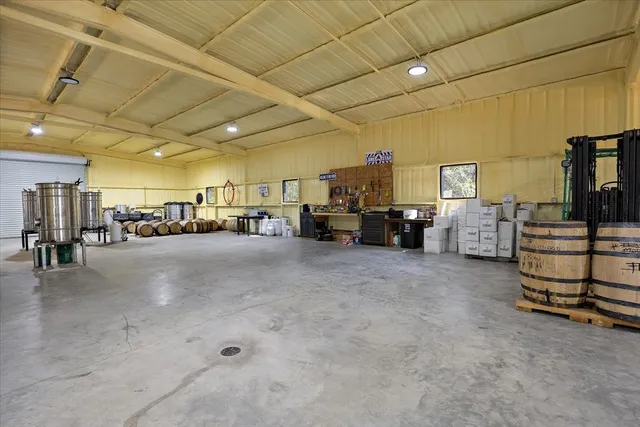 a view of a house with a road