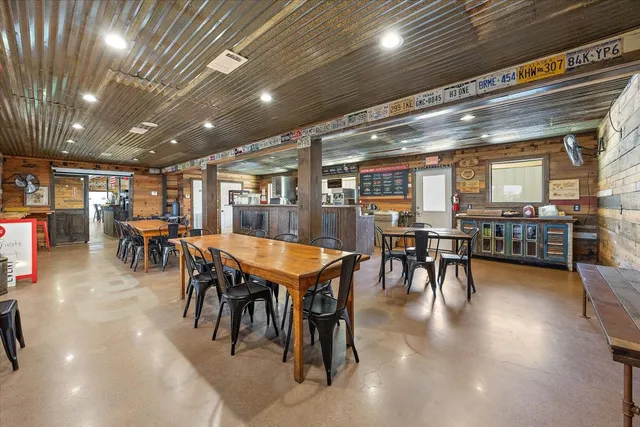 a view of a room with wooden walls