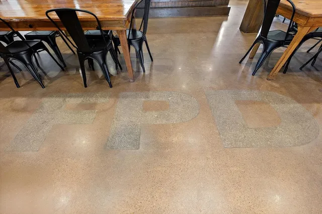 a view of a kitchen with a window and a table