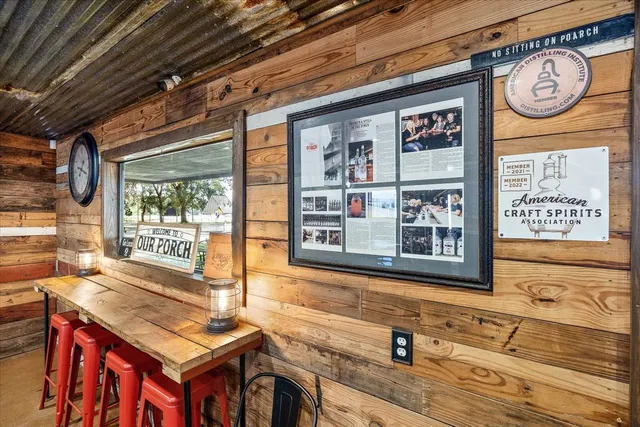 a view of a swimming pool with a lot of chairs and tables