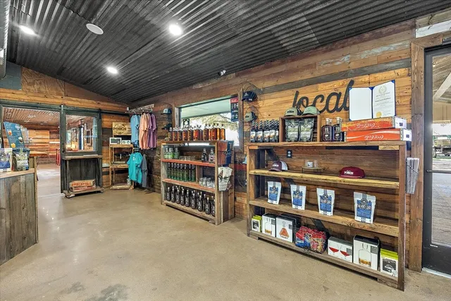 a utility room with lots of different colored cloths