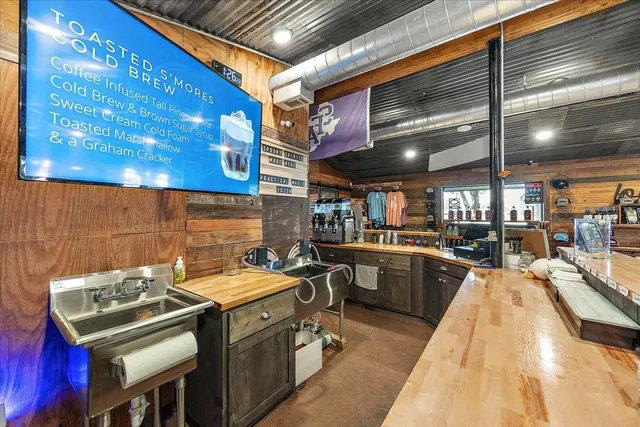 a sign board with street view