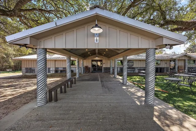a view of parking garage with cars