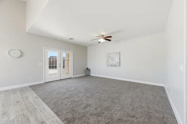 a bathroom with a sink toilet and a mirror