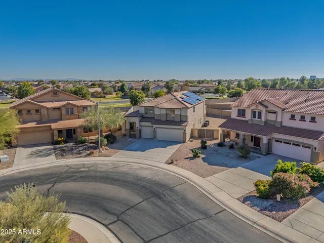 an entrance to house with yard