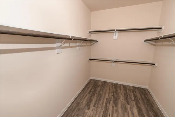 a view of a room with racks on the wall