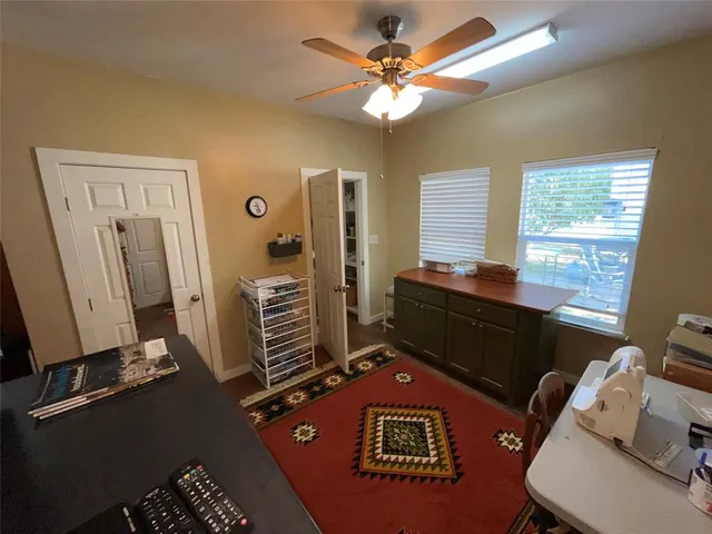 a room with furniture and a flat screen tv