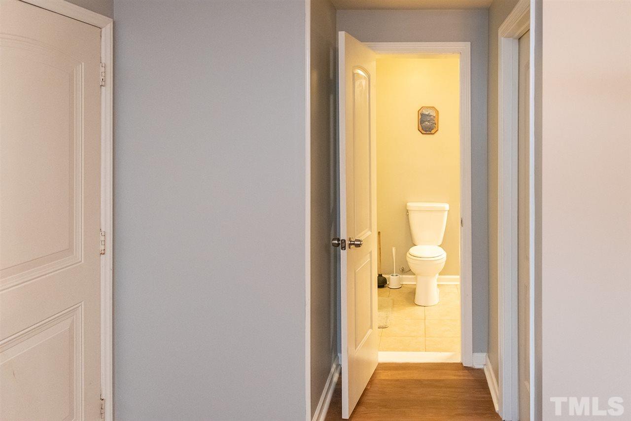 1242 Marler Road Benson, NC 27504 - Photo 22 of 30 a view of a bathroom from a hallway