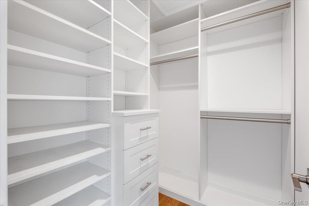 109 Lee Road Scarsdale, NY 10583 - Photo 13 of 30 a view of walk in closet with empty racks