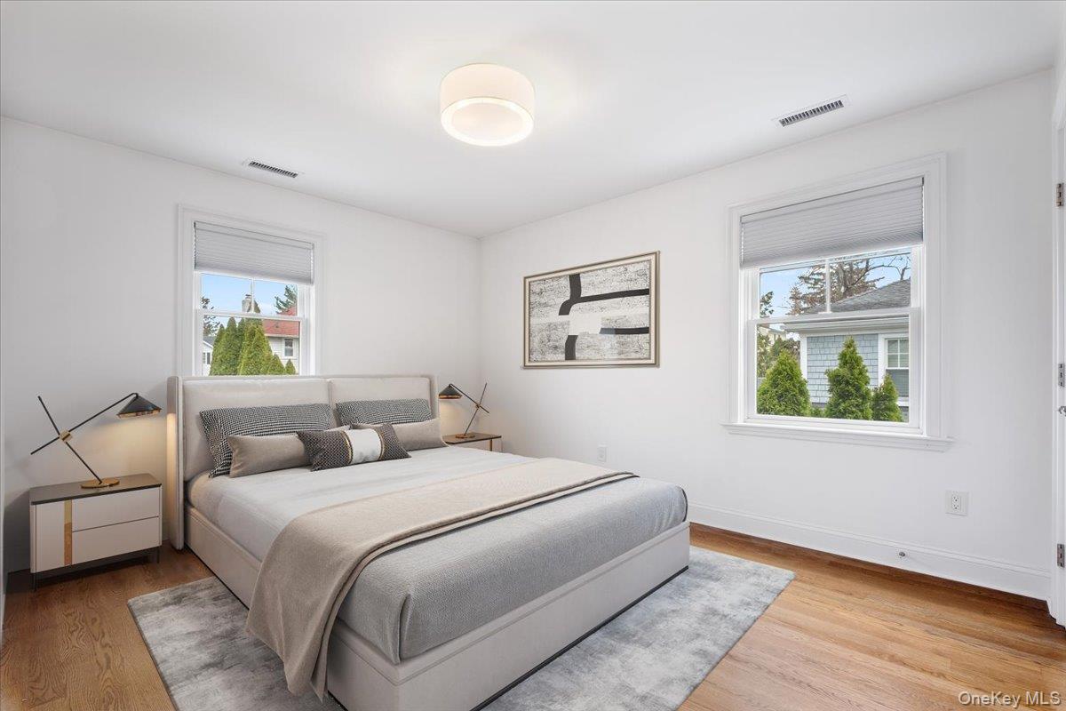 109 Lee Road Scarsdale, NY 10583 - Photo 18 of 30 a bedroom with a bed and a window