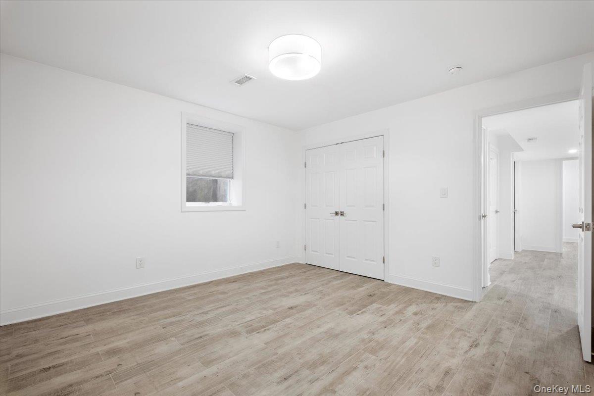 109 Lee Road Scarsdale, NY 10583 - Photo 21 of 30 wooden floor in an empty room