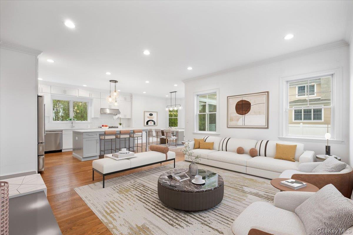 109 Lee Road Scarsdale, NY 10583 - Photo 6 of 30 a living room with furniture and a large window