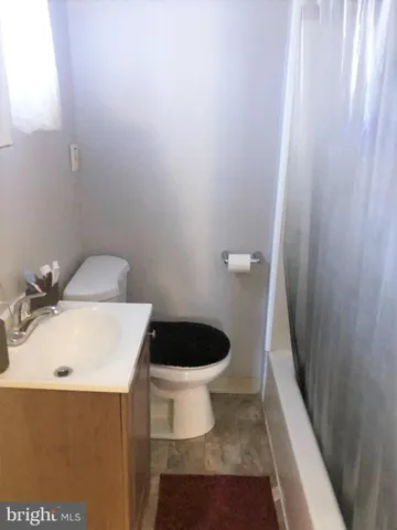 a bathroom with a sink and a toilet