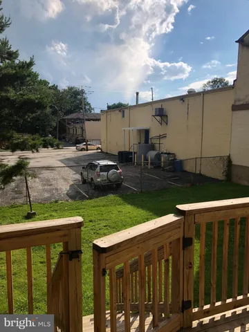a view of a porch with a yard
