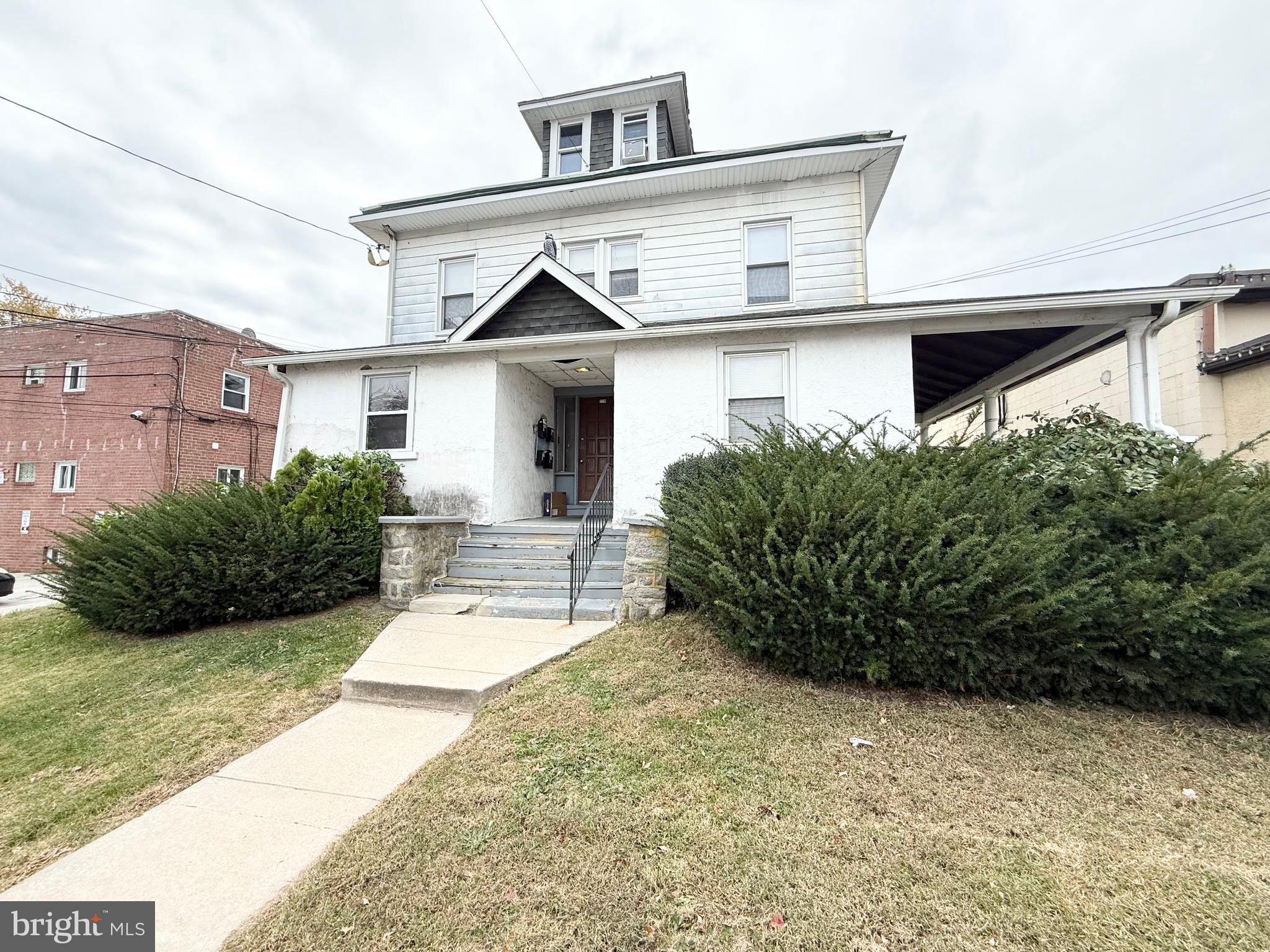 229 Ridley Avenue, Unit 1 Folsom, PA 19033 - Photo 2 of 13 a view of a house with a yard
