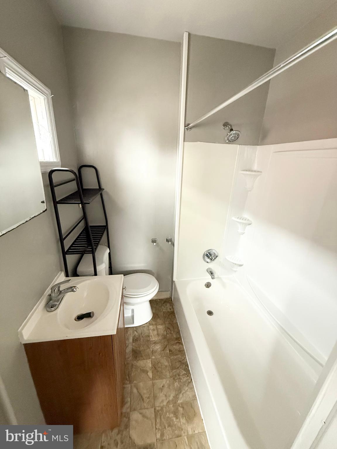 229 Ridley Avenue, Unit 1 Folsom, PA 19033 - Photo 10 of 13 a bathroom with a bathtub and a shower
