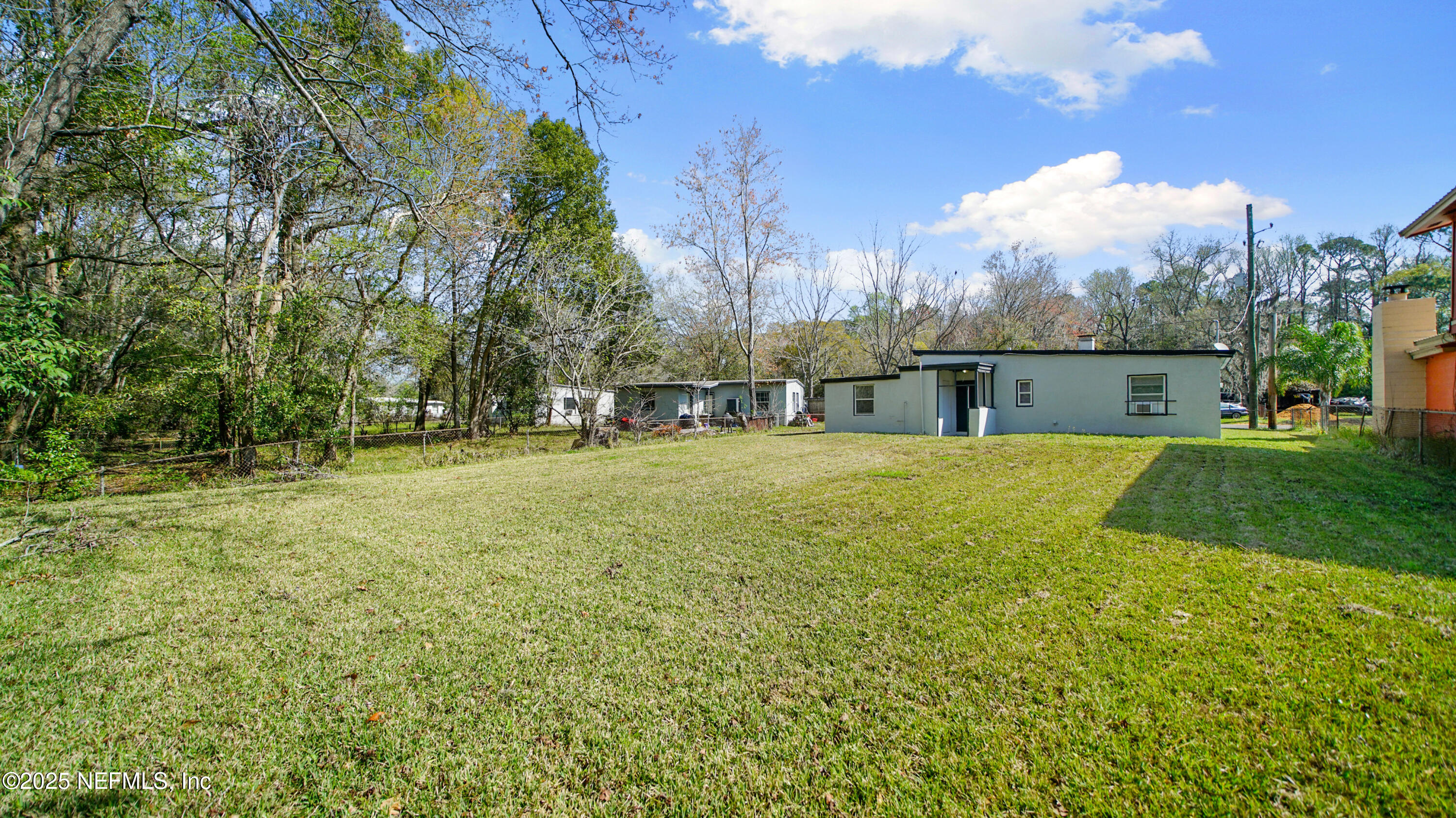 5524 Verbena Road Jacksonville, FL 32209 - Photo 17 of 17 a view of a backyard with large trees