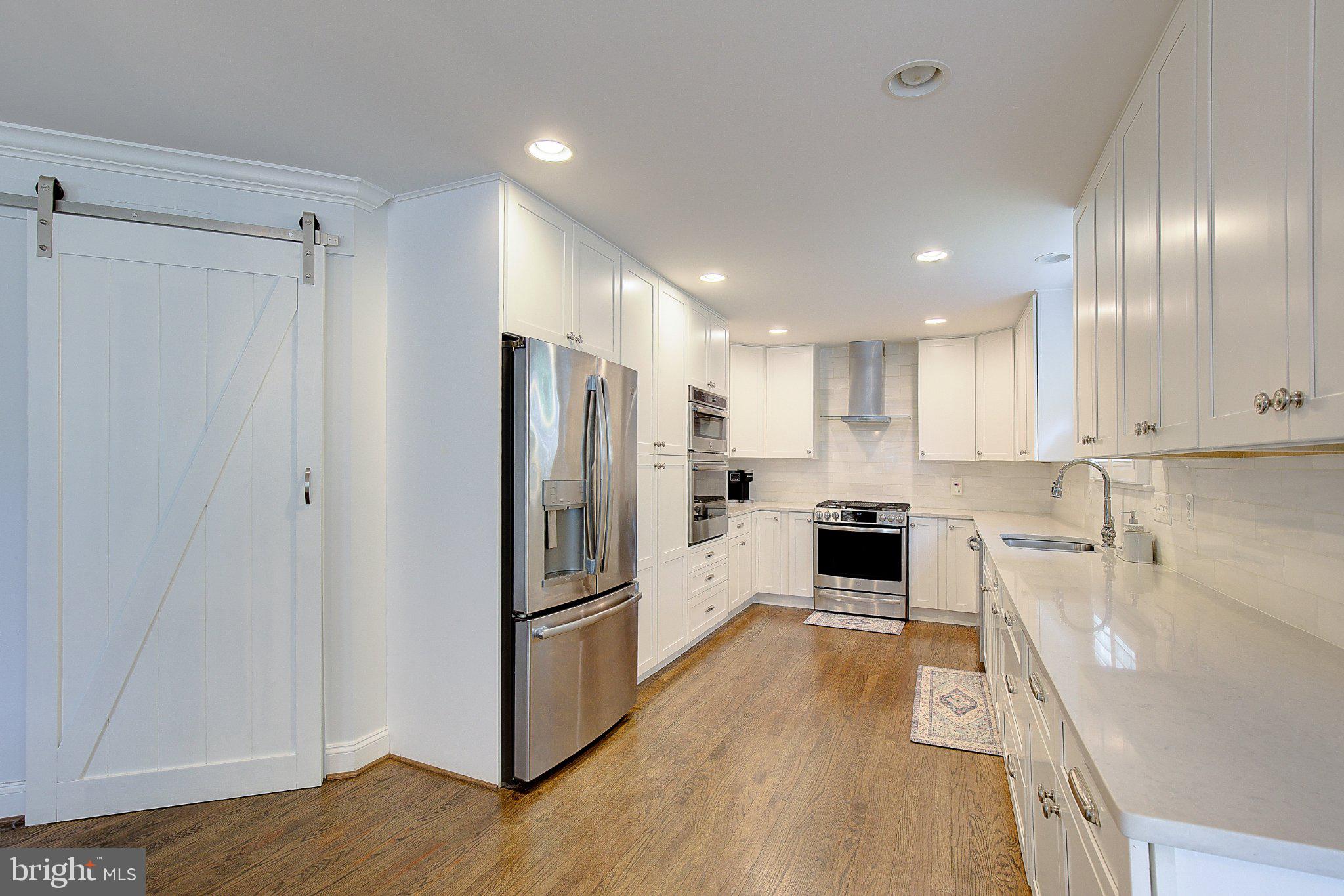 980 Apple Lane Solomons, MD 20629 - Photo 12 of 82 Modern kitchen with sleek finishes.