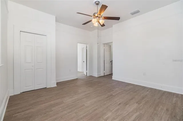 a view of an empty room with a window