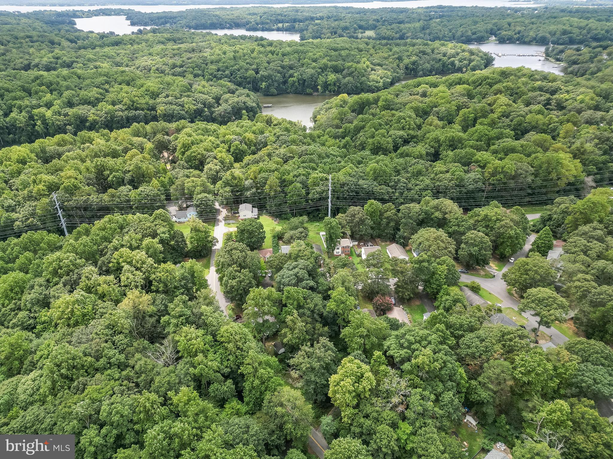 8453 Pine Boulevard Lusby, MD 20657 - Photo 14 of 14 an aerial view of residential houses with outdoor space and trees