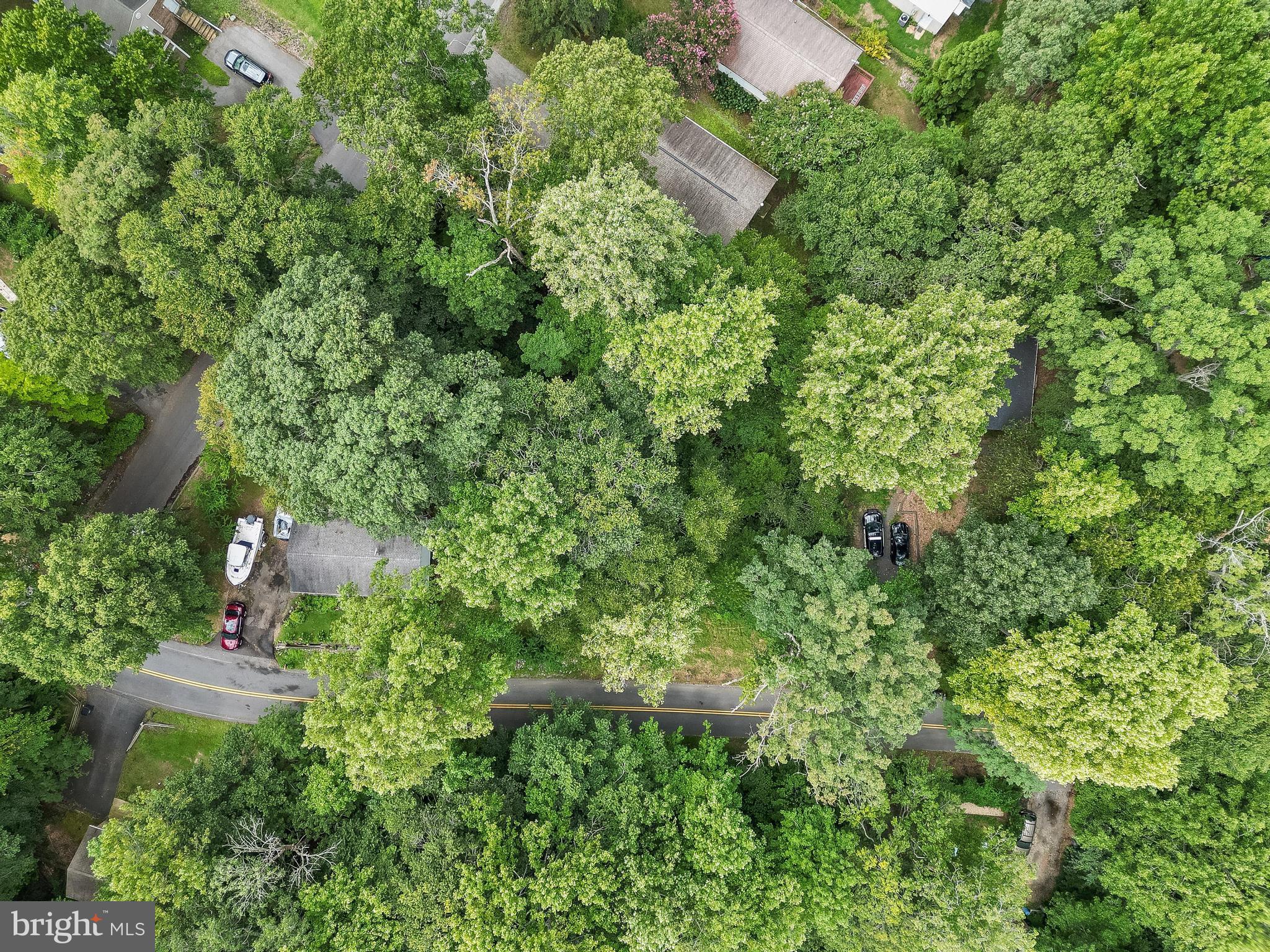 8453 Pine Boulevard Lusby, MD 20657 - Photo 4 of 14 an aerial view of a house with a yard