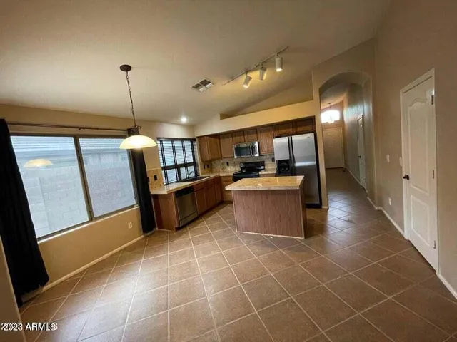 a view of a kitchen with a sink
