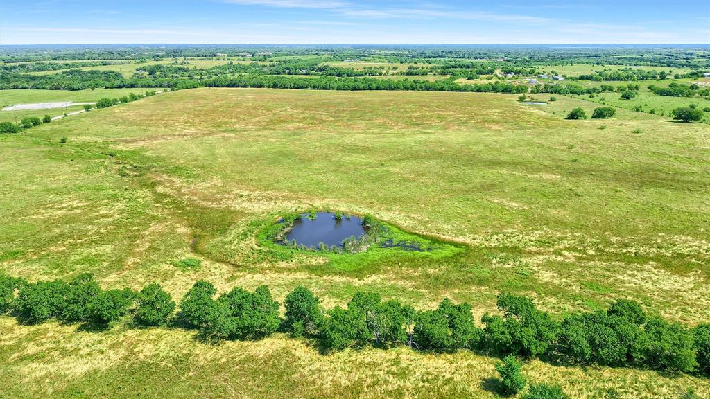 105 A Spalding Road Whitesboro, TX 76273 - Photo 12 of 30 a view of an outdoor space and a lake view