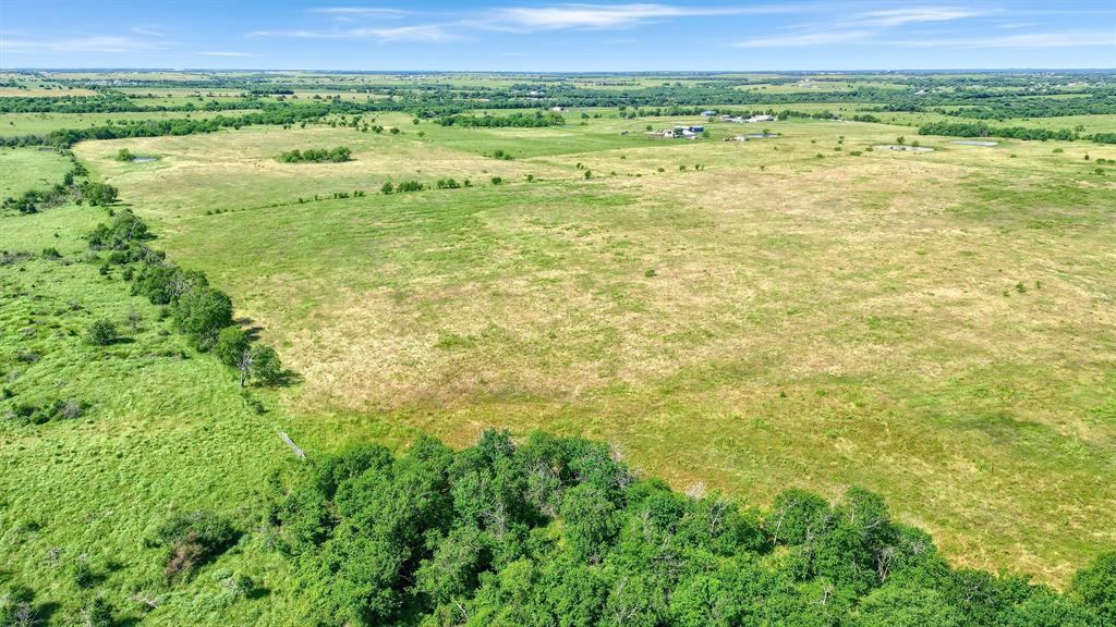 105 A Spalding Road Whitesboro, TX 76273 - Photo 13 of 30 a view of an outdoor space with a lake view