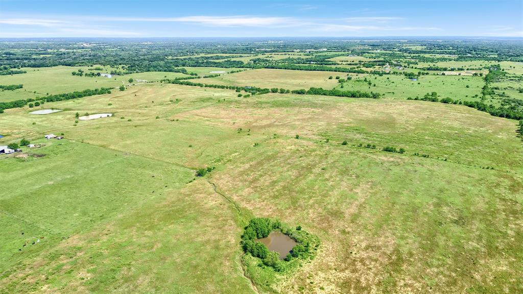 105 A Spalding Road Whitesboro, TX 76273 - Photo 14 of 30 a view of an outdoor space and a lake view
