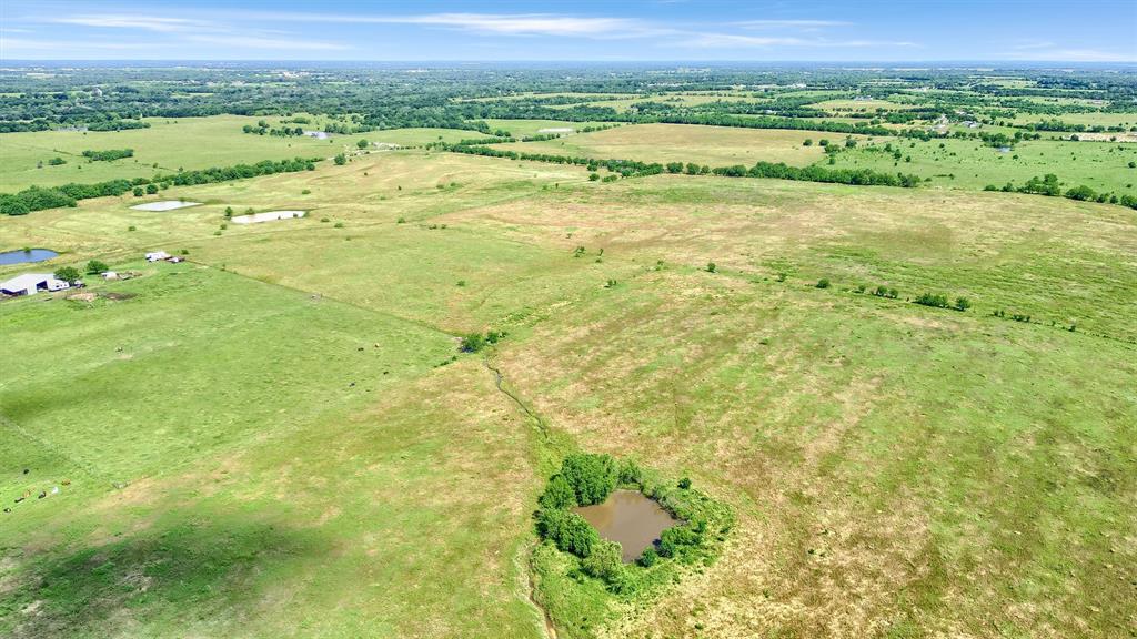105 A Spalding Road Whitesboro, TX 76273 - Photo 15 of 30 a view of a field with an ocean view