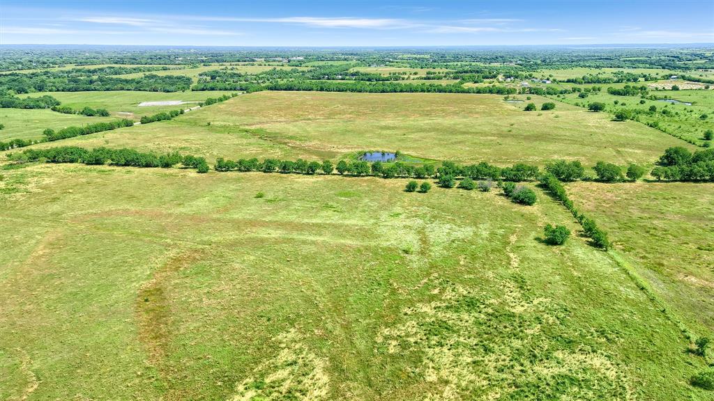 105 A Spalding Road Whitesboro, TX 76273 - Photo 23 of 30 a view of an outdoor space with a lake view