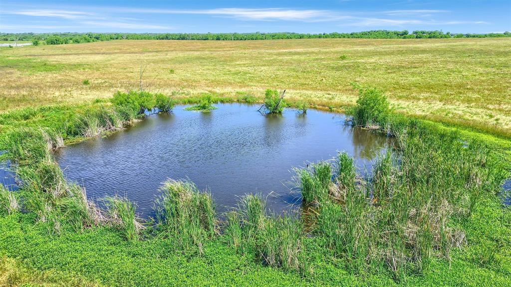 105 A Spalding Road Whitesboro, TX 76273 - Photo 25 of 30 a view of an outdoor space and a lake view