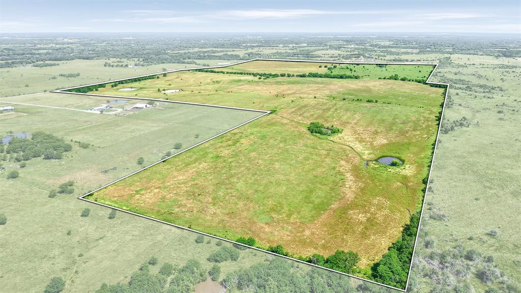 105 A Spalding Road Whitesboro, TX 76273 - Photo 30 of 30 a view of an ocean and beach