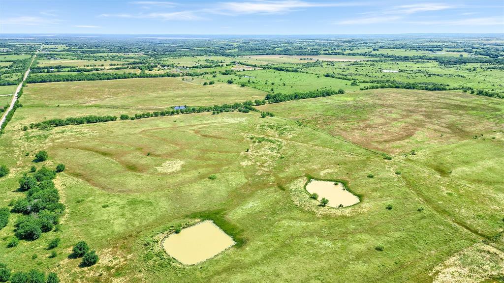 105 A Spalding Road Whitesboro, TX 76273 - Photo 6 of 30 a view of an outdoor space and a lake view