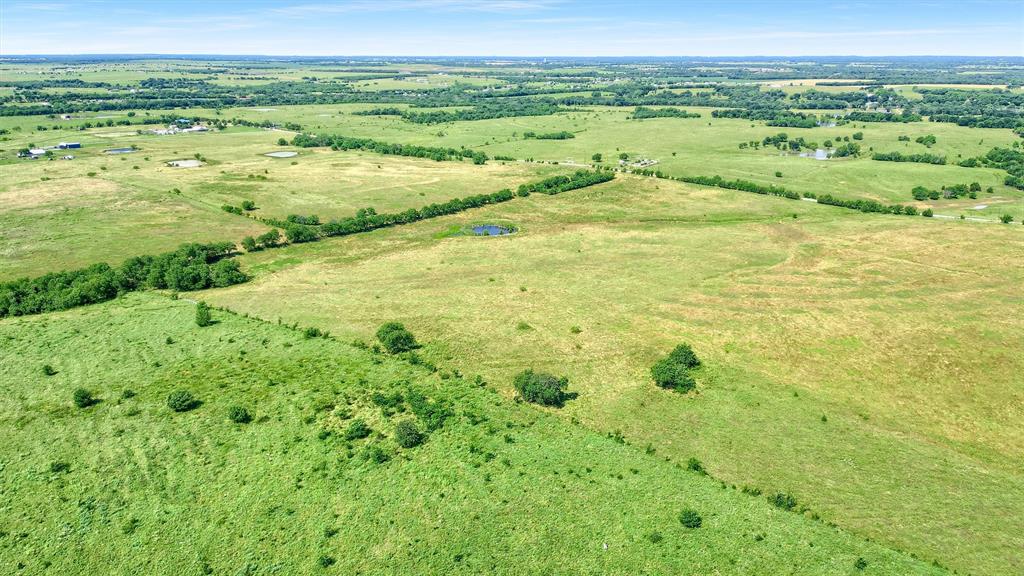 105 A Spalding Road Whitesboro, TX 76273 - Photo 7 of 30 a view of an outdoor space with a lake view