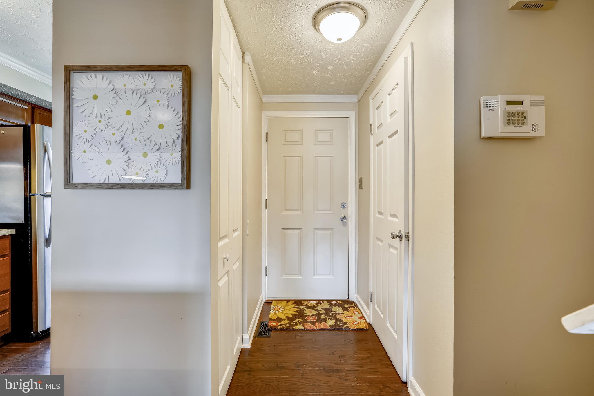 7 Farmcrest Court Silver Spring, MD 20905 - Photo 13 of 42 Entrance Foyer with Coat Closet & Powder Room