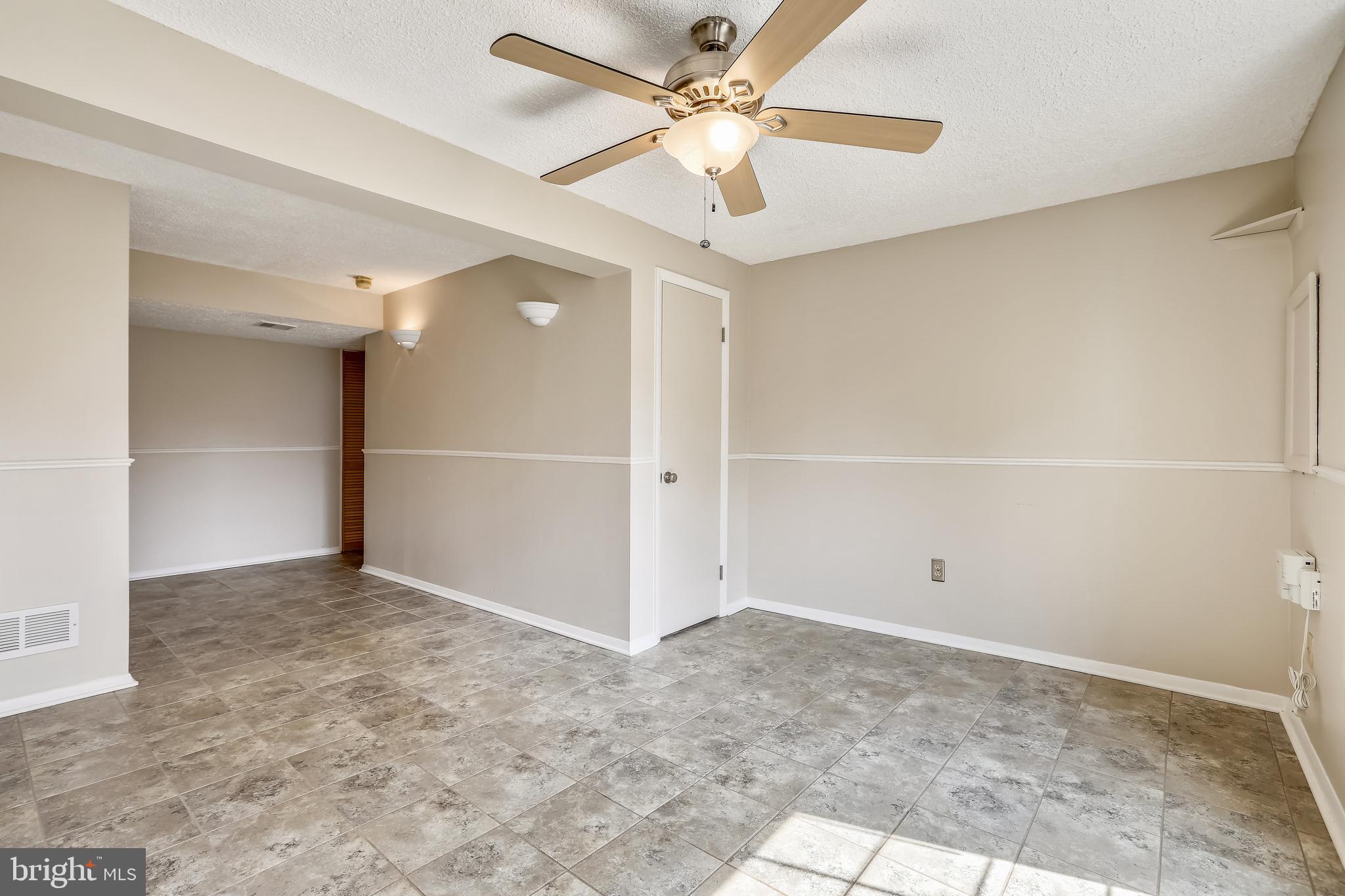 7 Farmcrest Court Silver Spring, MD 20905 - Photo 15 of 42 Finished Lower Level with Ceramic Tile
