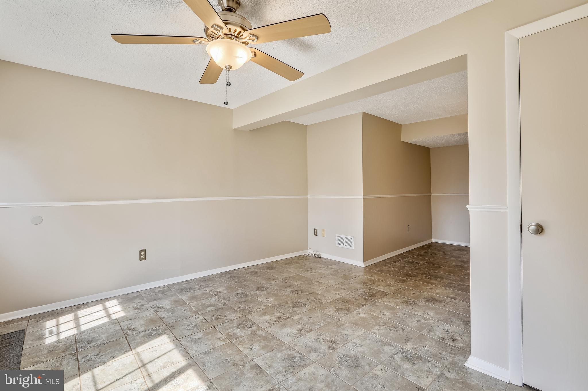 7 Farmcrest Court Silver Spring, MD 20905 - Photo 16 of 42 Finished Lower Level with Ceramic Tile
